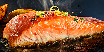 Salmon on griddle with Ukuva Gold Sauce