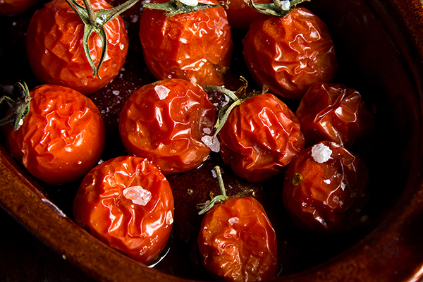 Semi-dried vine tomatoes with salt and olive oil.